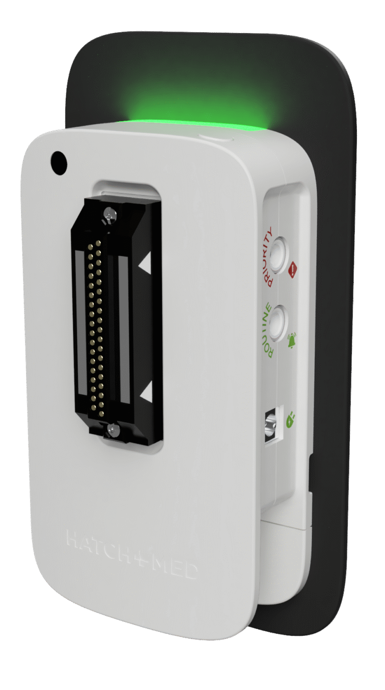 A white HighLightX unit with a green light along its top edge.