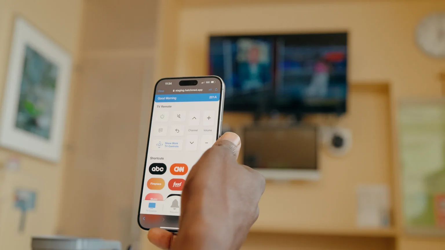 Phone showing the TV channel guide in ComCierge BYOD